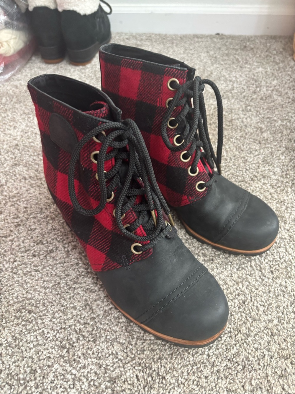 Sorel Women’s Red and Black Buffalo Plaid Lace-Up Ankle Boots